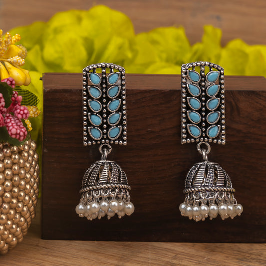 Sky Blue Stone Studded German Silver Statement Earrings With Brass Jhumki