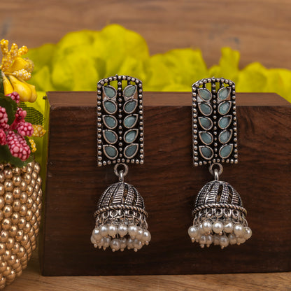 Mint Stone Studded German Silver Statement Earrings With Brass Jhumki