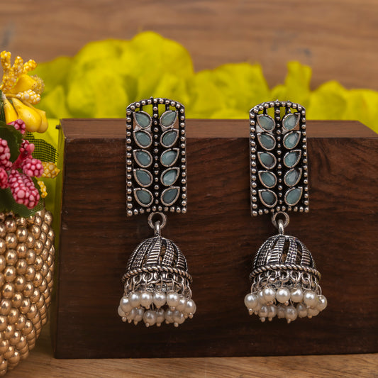 Mint Stone Studded German Silver Statement Earrings With Brass Jhumki