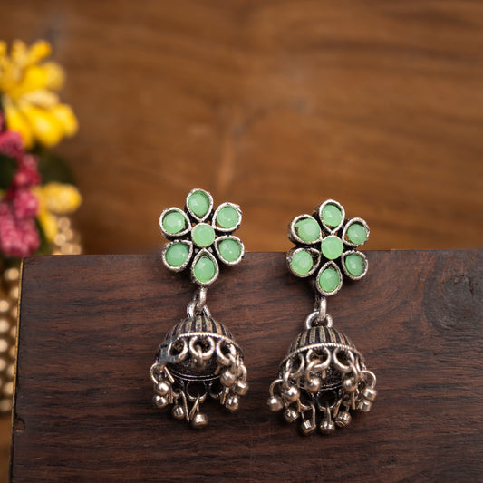 Pista Stone Studded Oxidised Earrings With Hanging Jhumki