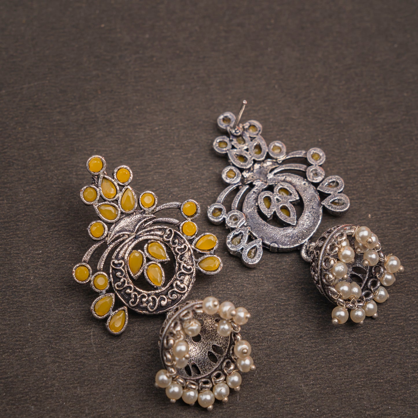 Yellow Stone Studded Oxidised Earrings With Hanging Jhumka