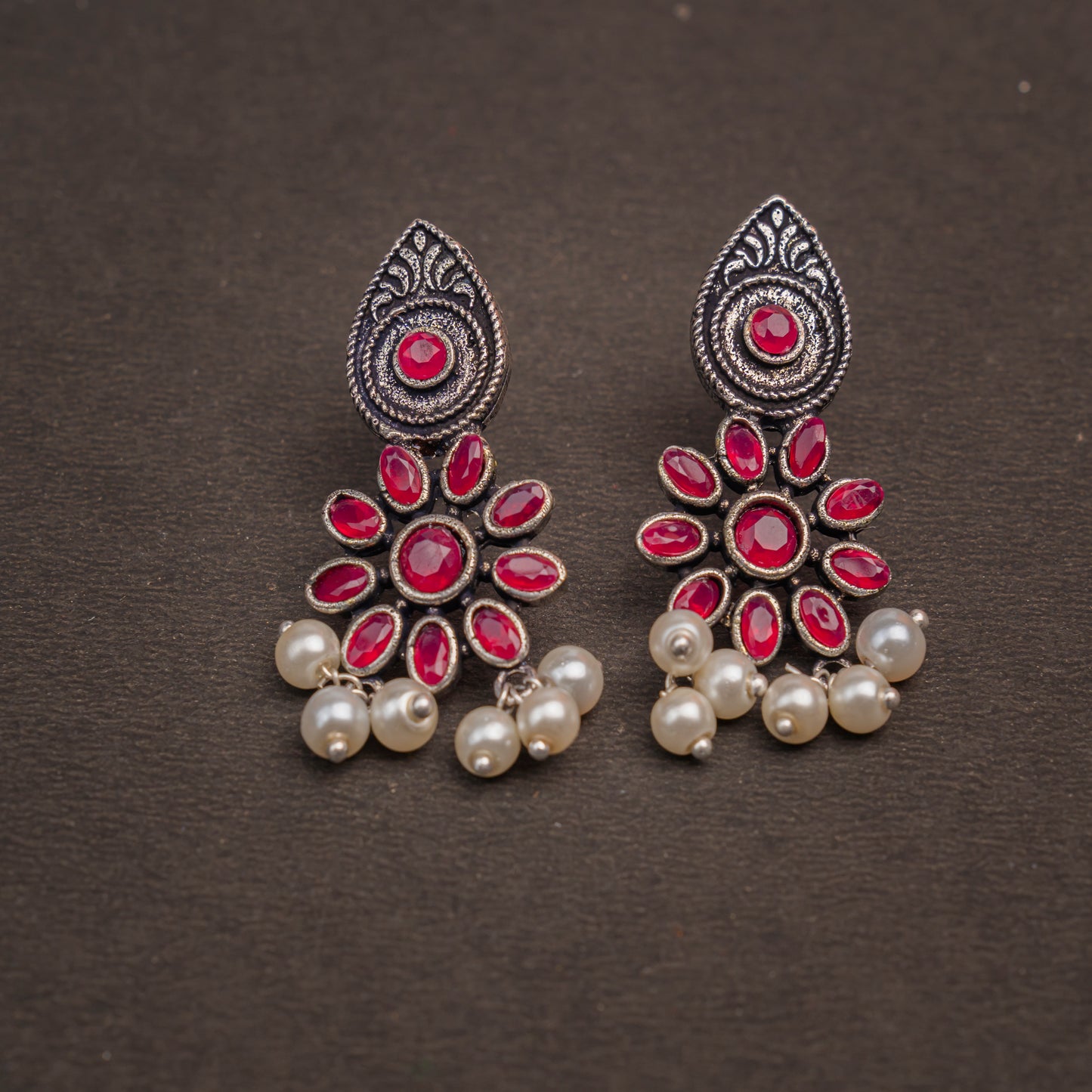 Red Stone Studded Oxidised Earrings With Hanging Pearls