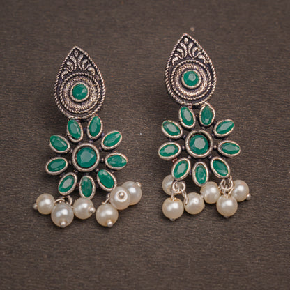 Green Stone Studded Oxidised Earrings With Hanging Pearls