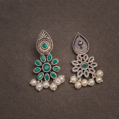 Green Stone Studded Oxidised Earrings With Hanging Pearls
