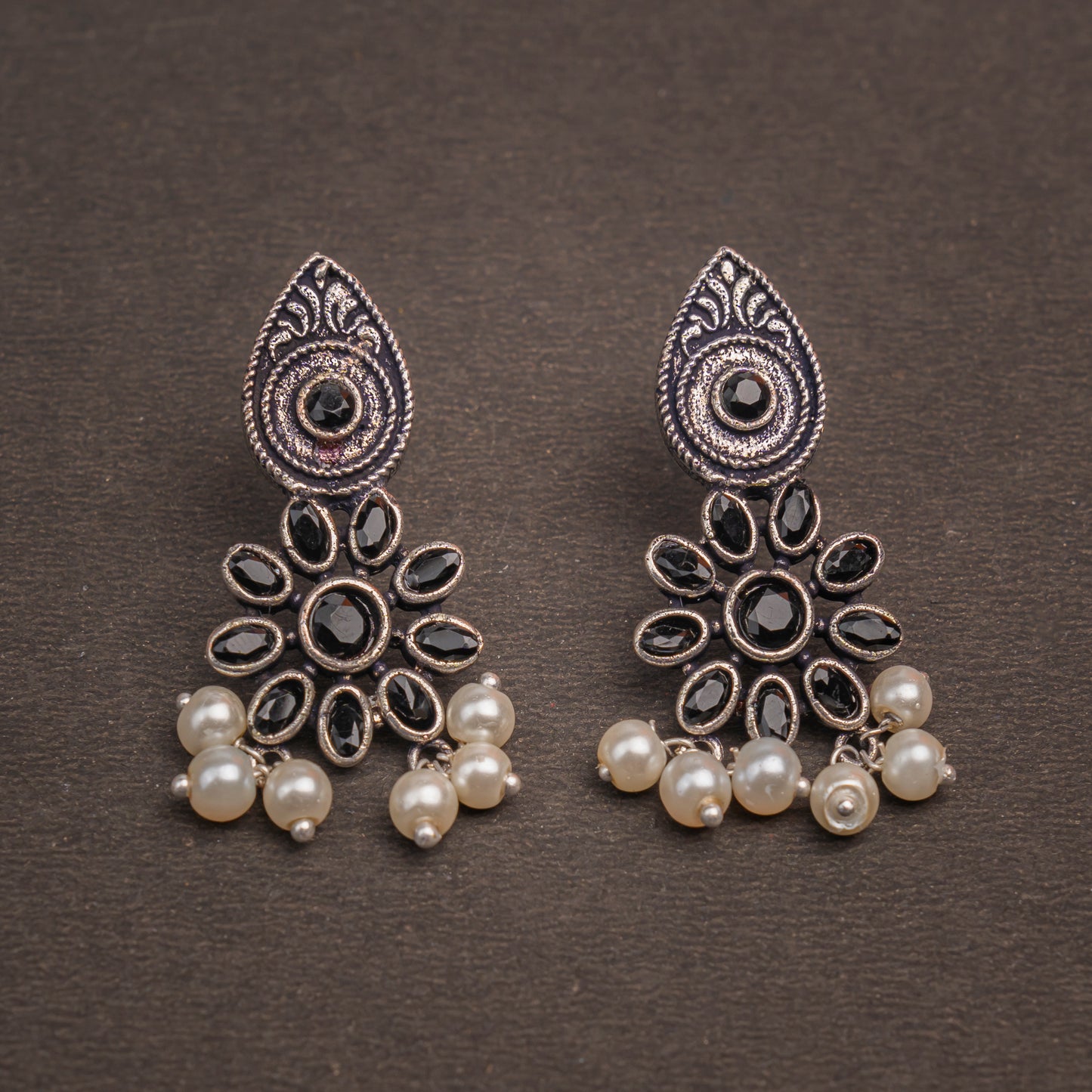Black Stone Studded Oxidised Earrings With Hanging Pearls