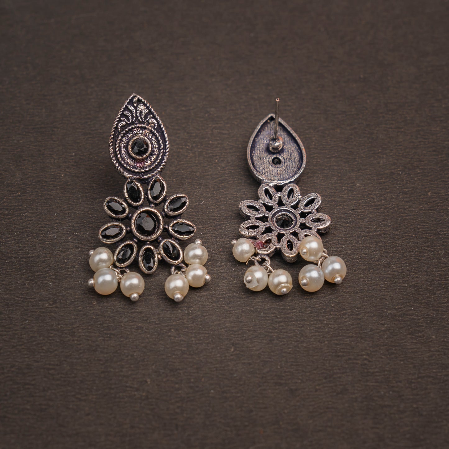 Black Stone Studded Oxidised Earrings With Hanging Pearls