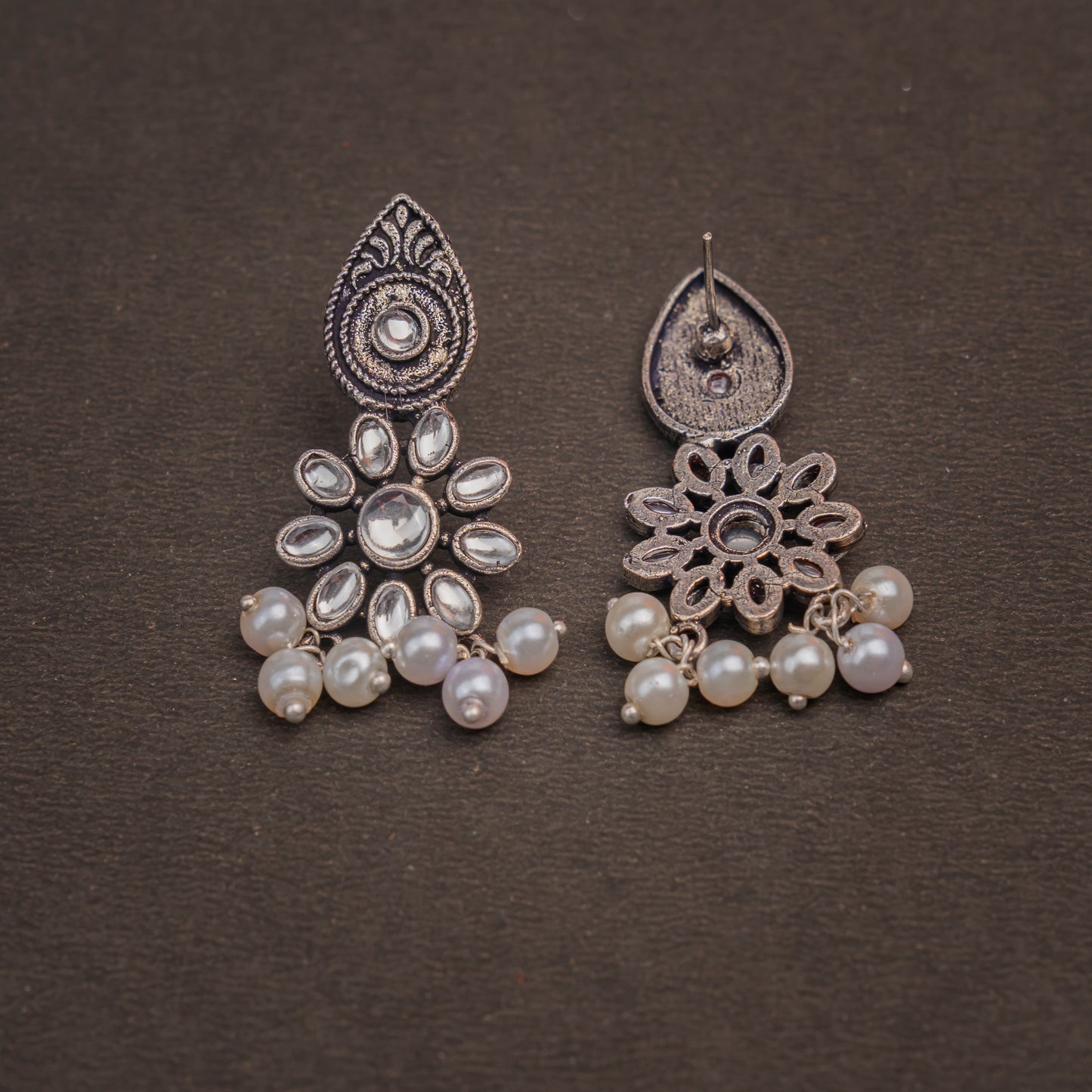 White Stone Studded Oxidised Earrings With Hanging Pearls