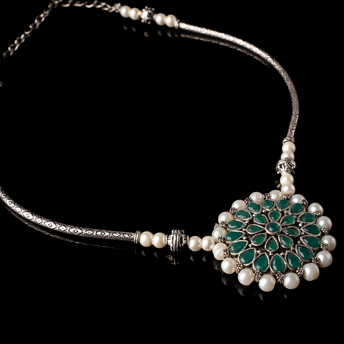 Stylish Brass Piped Neckpiece With Earrings Embellished With Green Stone And Pearls