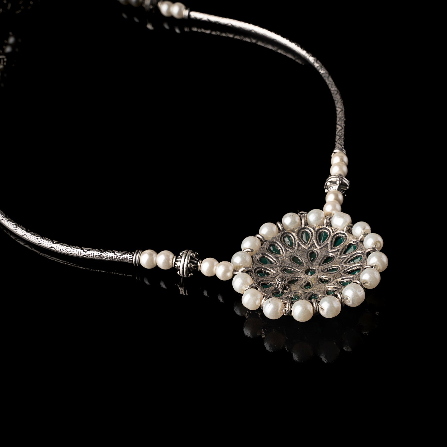 Stylish Brass Piped Neckpiece With Earrings Embellished With Green Stone And Pearls