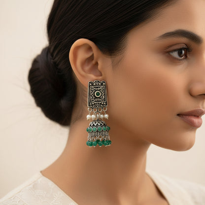 oxidized jhumka earrings with pearl and green stone detailing