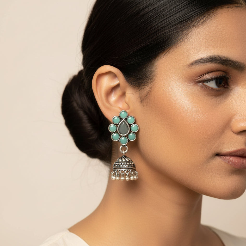 oxidized mint floral jhumka earrings with teardrop motif