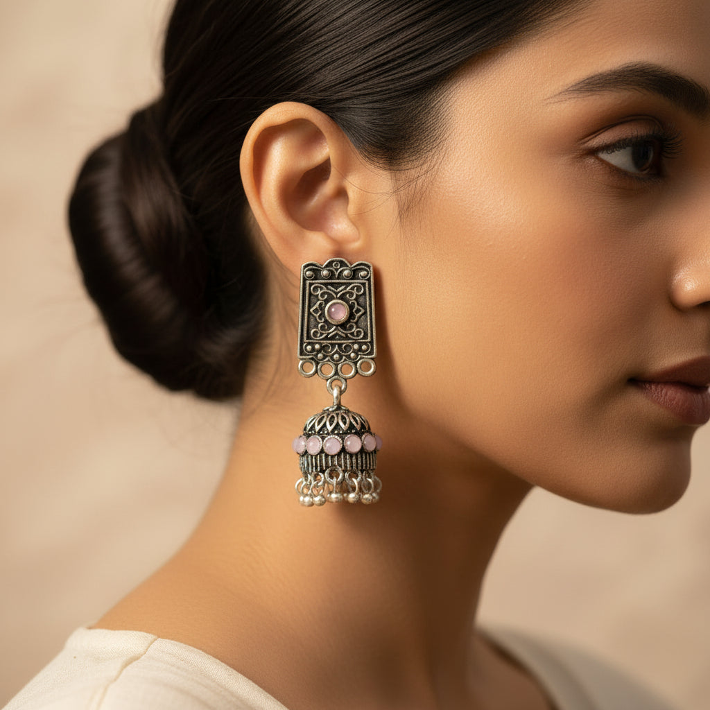 oxidized  jhumka earrings with pearl and baby pink stone detailin.