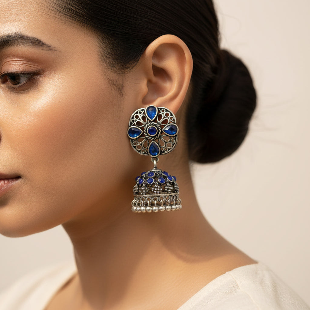 oxidized floral jhumka earrings with Blue stone detailing.