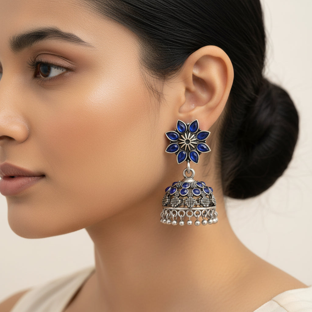 flower-shaped top with petal-like blue stones