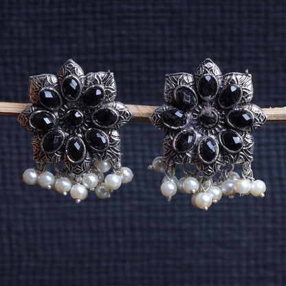Black Stone Studded Oxidised Earrings With Hanging Pearls