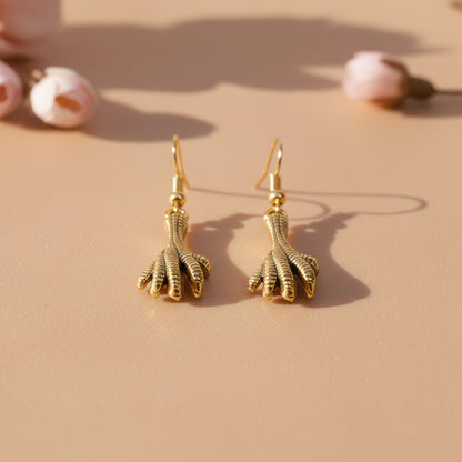 Talon twist dangler earrings