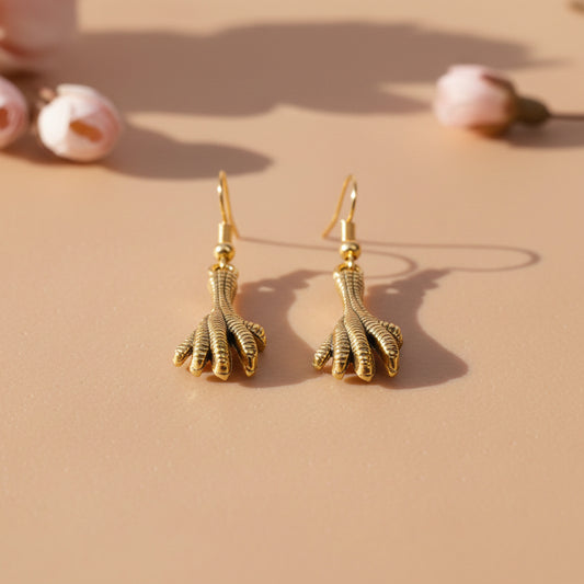 Talon twist dangler earrings