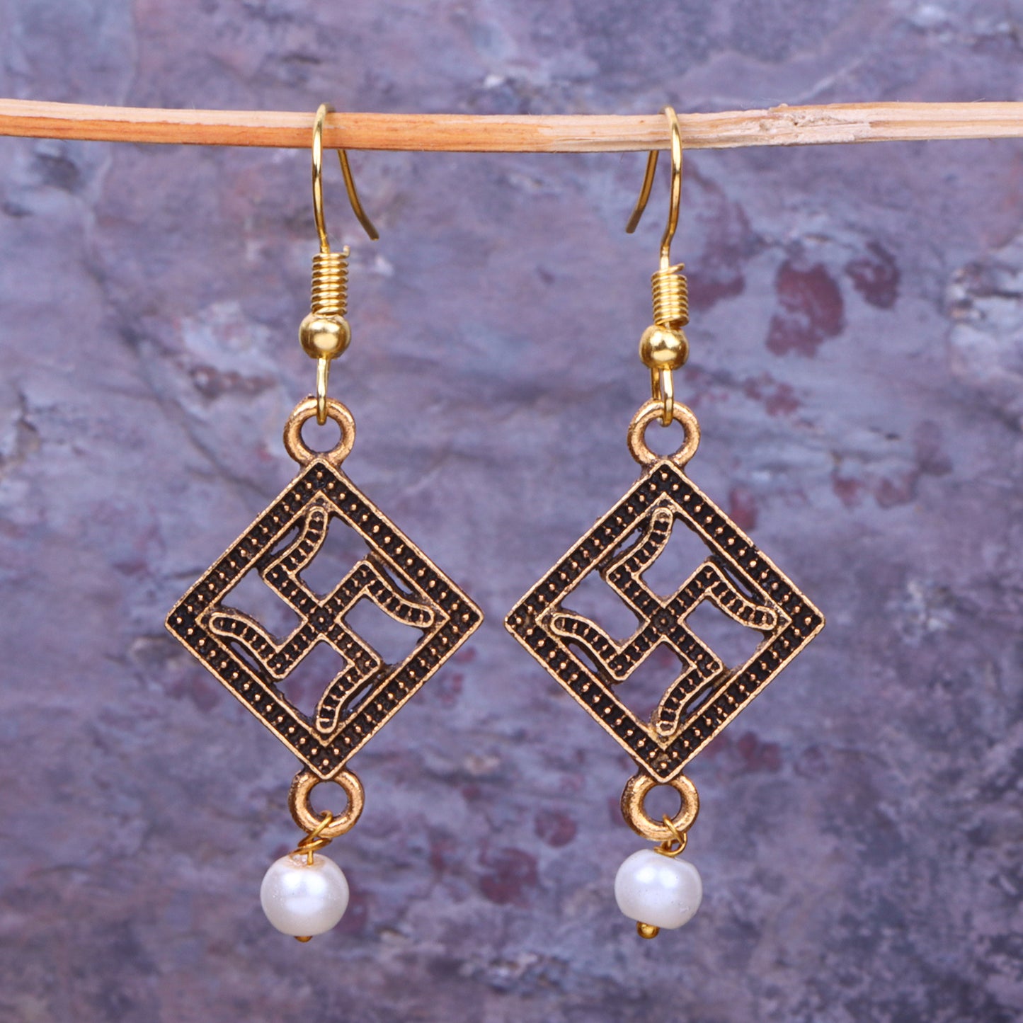 Swastik Shaped Golden Polished Oxidised Danglers