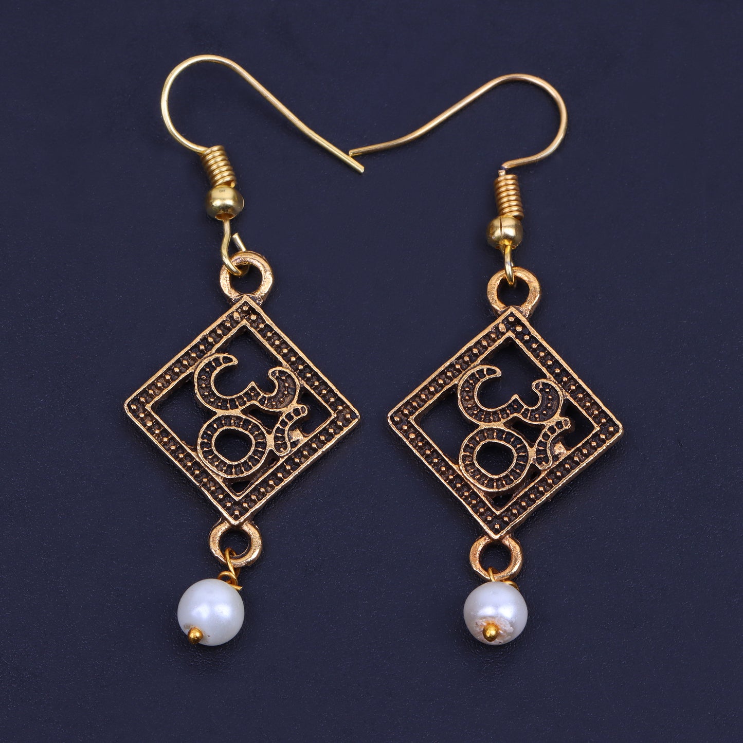 Om Shaped Golden Polished Oxidised Danglers