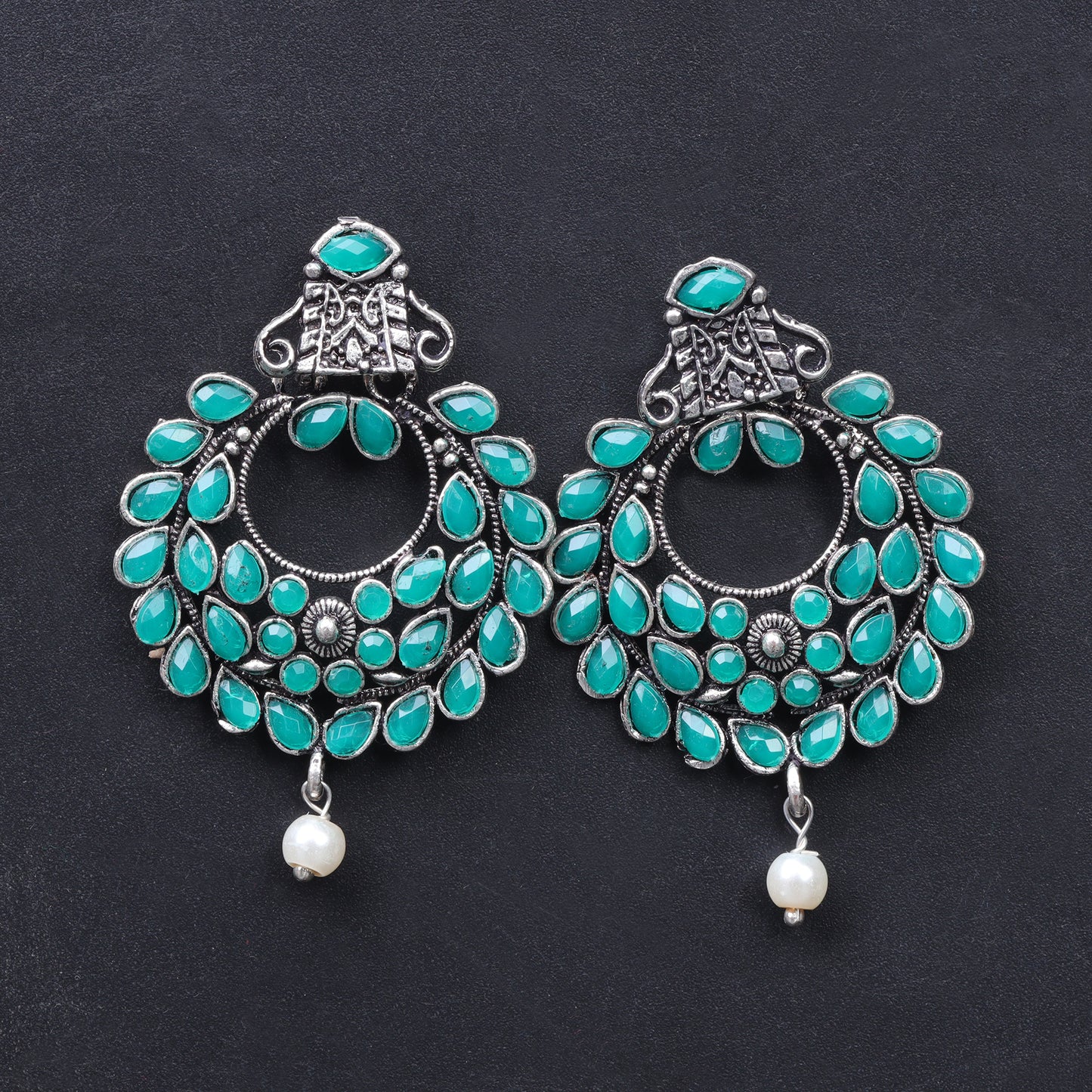 Green Stone Studded Intricate Earrings With Hanging Baby Pearl