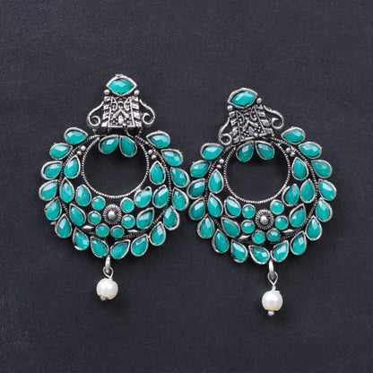 Green Stone Studded Intricate Earrings With Hanging Baby Pearl