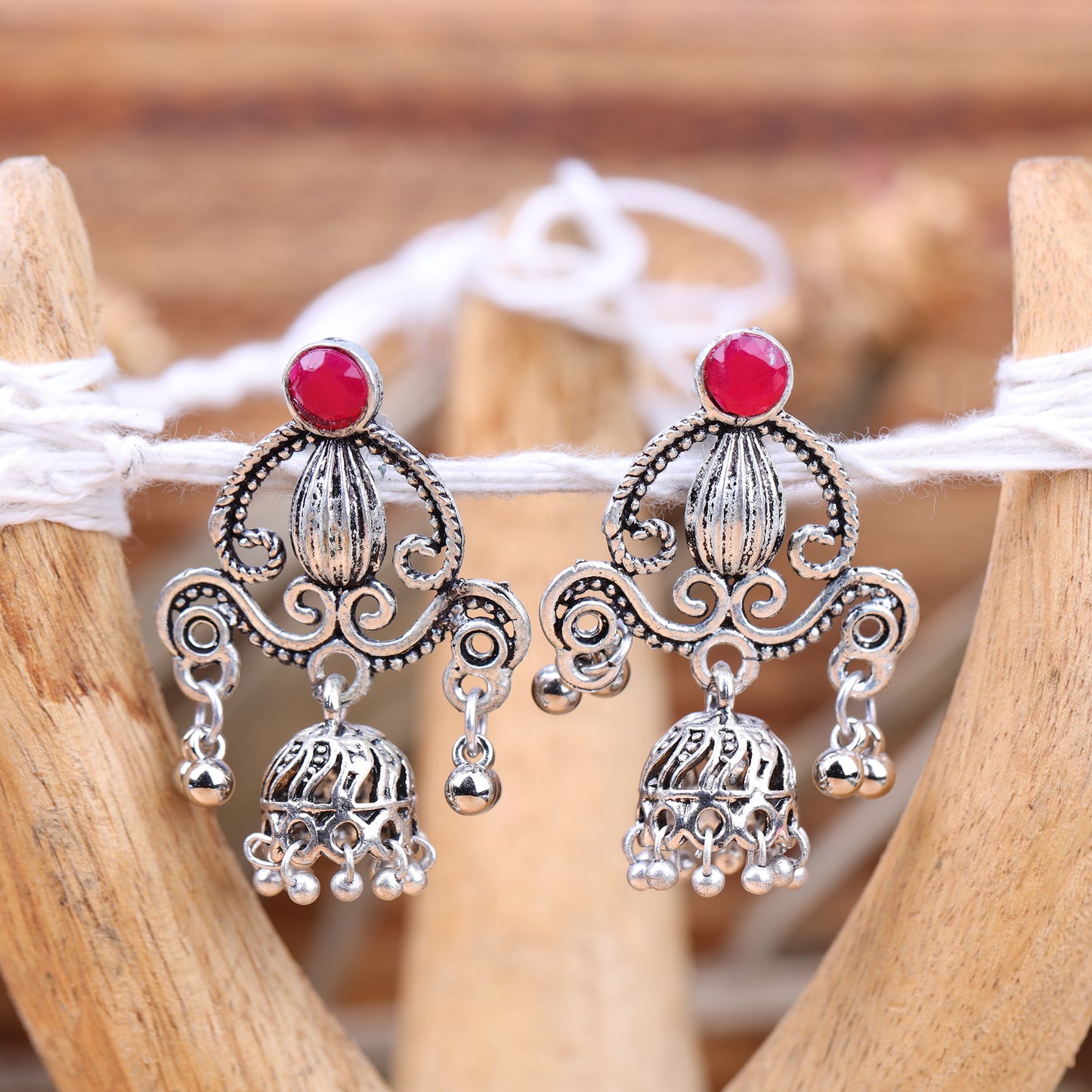 Red Stone Studded Intricate Jhumki Earrings