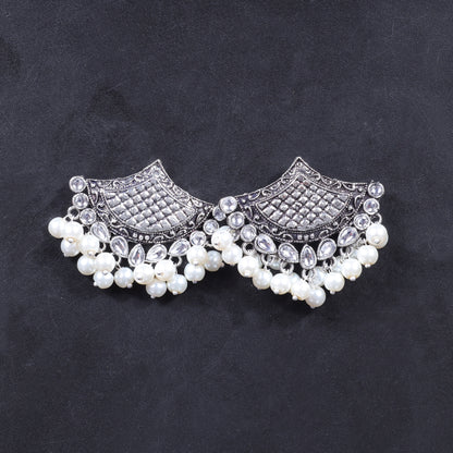White Stone Studded Lotus Petal Shaped Oxidised Earrings With Hanging Line Of Pearl