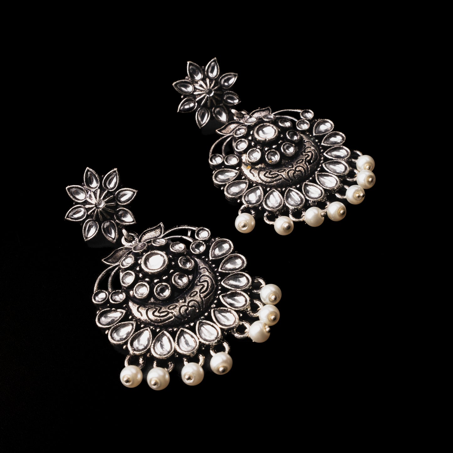 White Stone Studded Statement Oxidised Earrings With Hanging Pearls