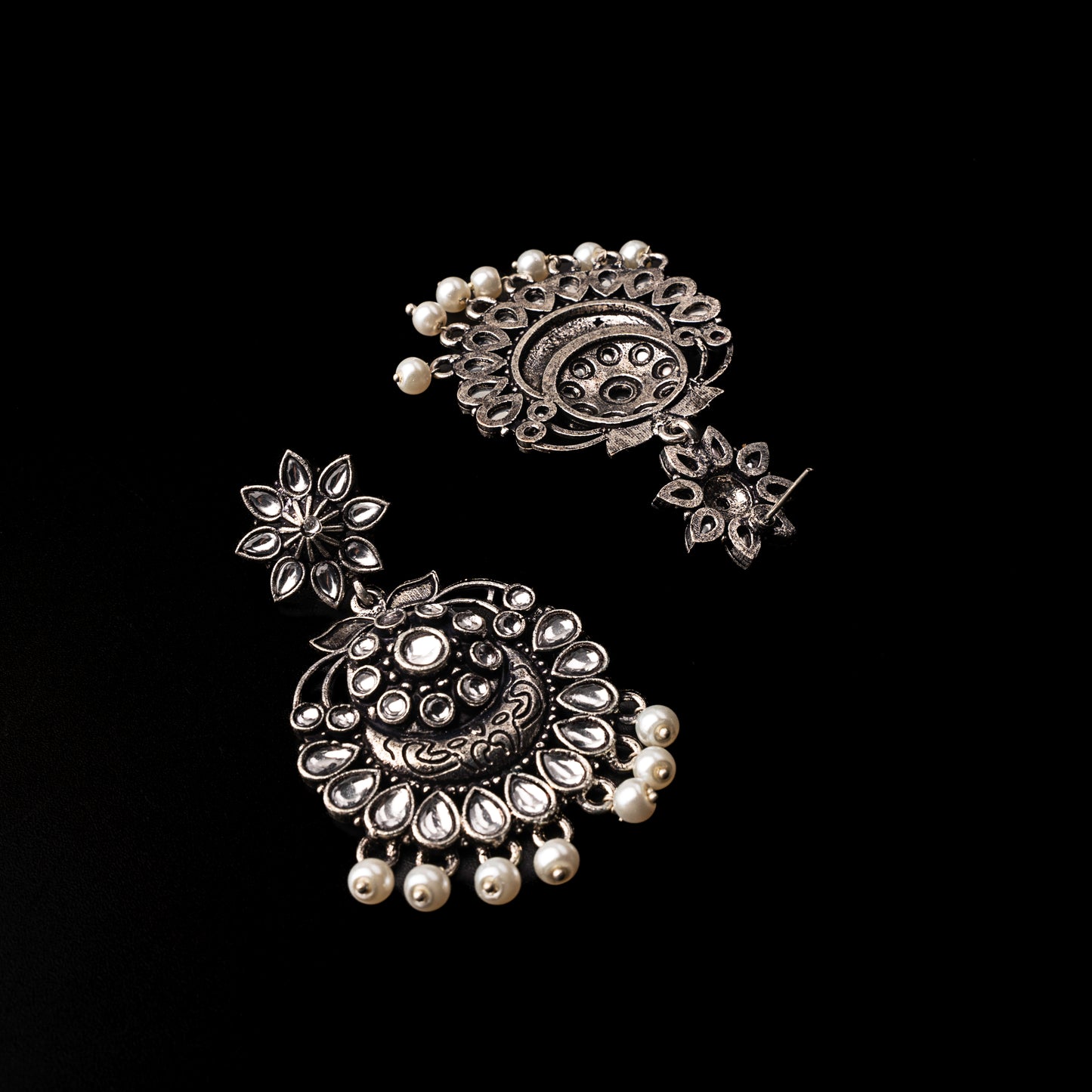 White Stone Studded Statement Oxidised Earrings With Hanging Pearls