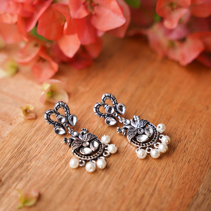 White Stone Studded Delicate Oxidised Earrings With Hanging Pearls