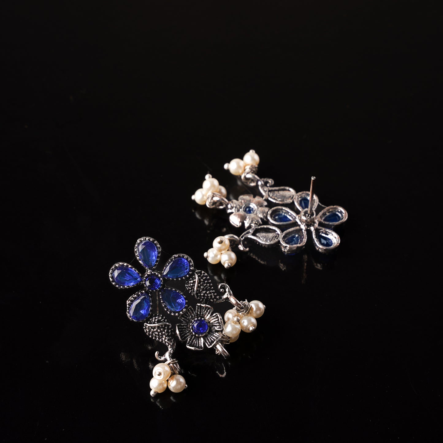 Blue Stone Studded Oxidised Earrings With Hanging Pearl