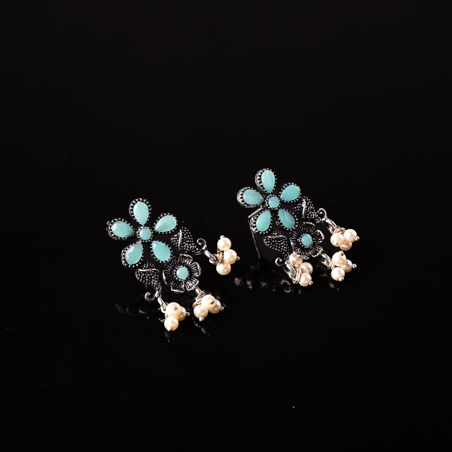 Mint Stone Studded Oxidised Earrings With Hanging Pearl