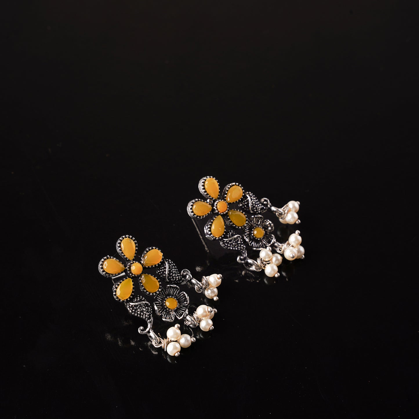 Yellow Stone Studded Oxidised Earrings With Hanging Pearl