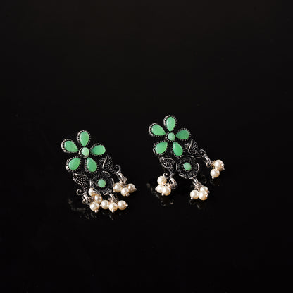 Pista Stone Studded Oxidised Earrings With Hanging Pearl