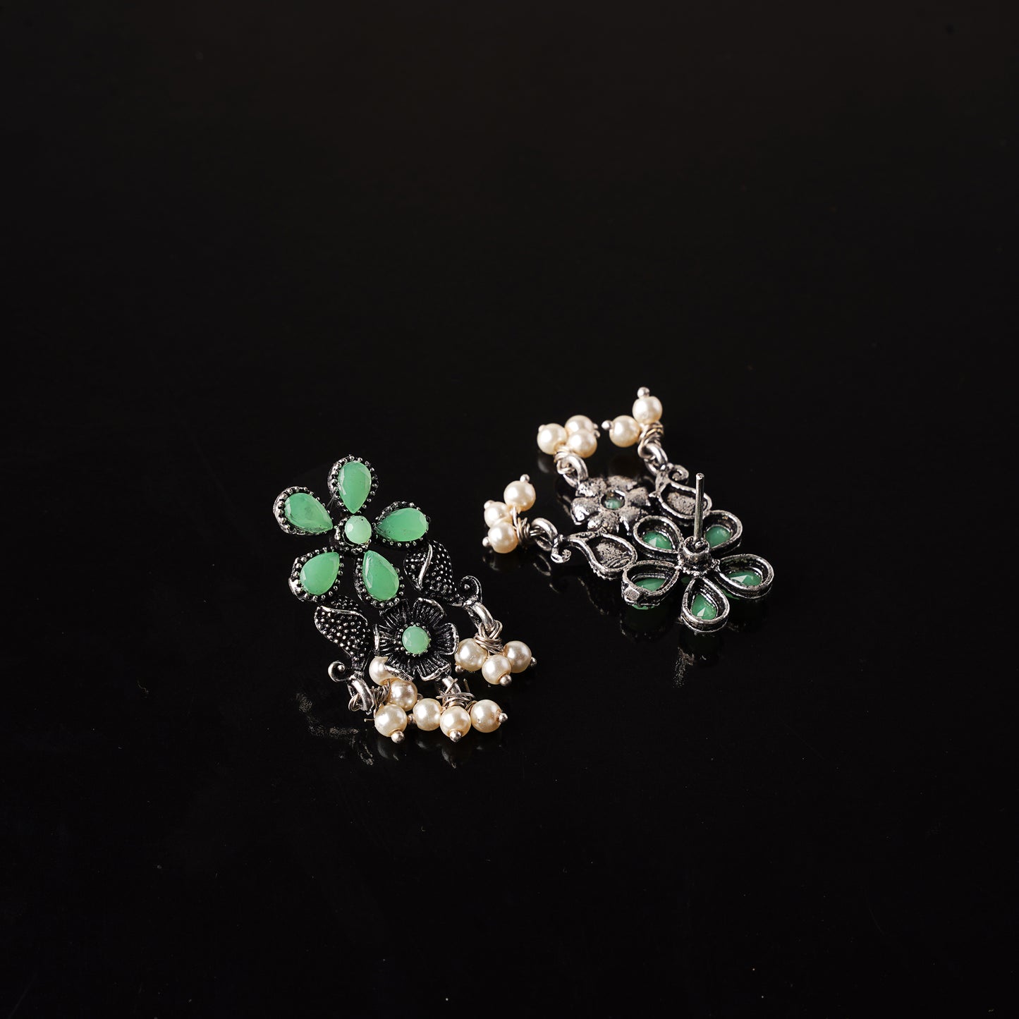 Pista Stone Studded Oxidised Earrings With Hanging Pearl