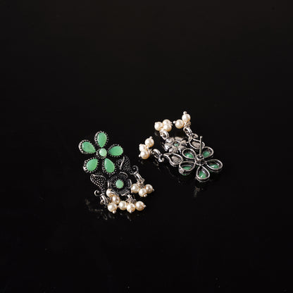 Pista Stone Studded Oxidised Earrings With Hanging Pearl