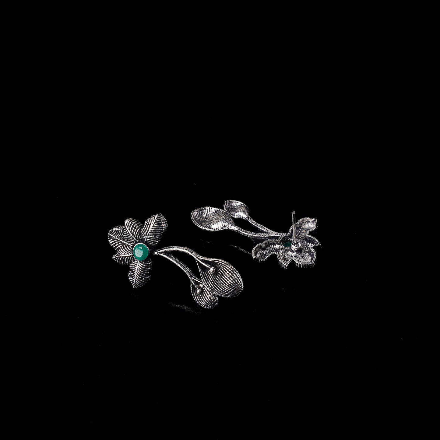 Green Stone Studded Flower Shaped Intricate Oxidised Earrings