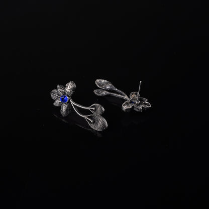 Blue Stone Studded Flower Shaped Intricate Oxidised Earrings