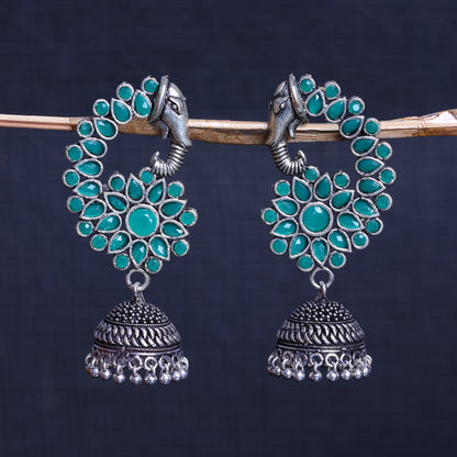 Green Stone Studded Oxidised Earrings With Hanging Jhumki