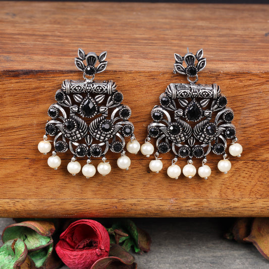 Black Stone Studded Oxidised Earrings With Hanging Pearls