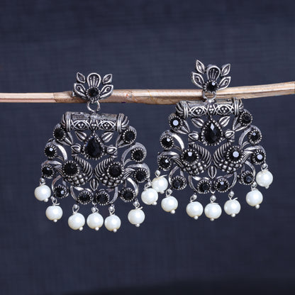 Black Stone Studded Oxidised Earrings With Hanging Pearls