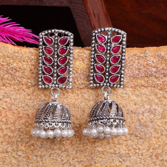 Red Stone Studded German Silver Statement Earrings With Brass Jhumki
