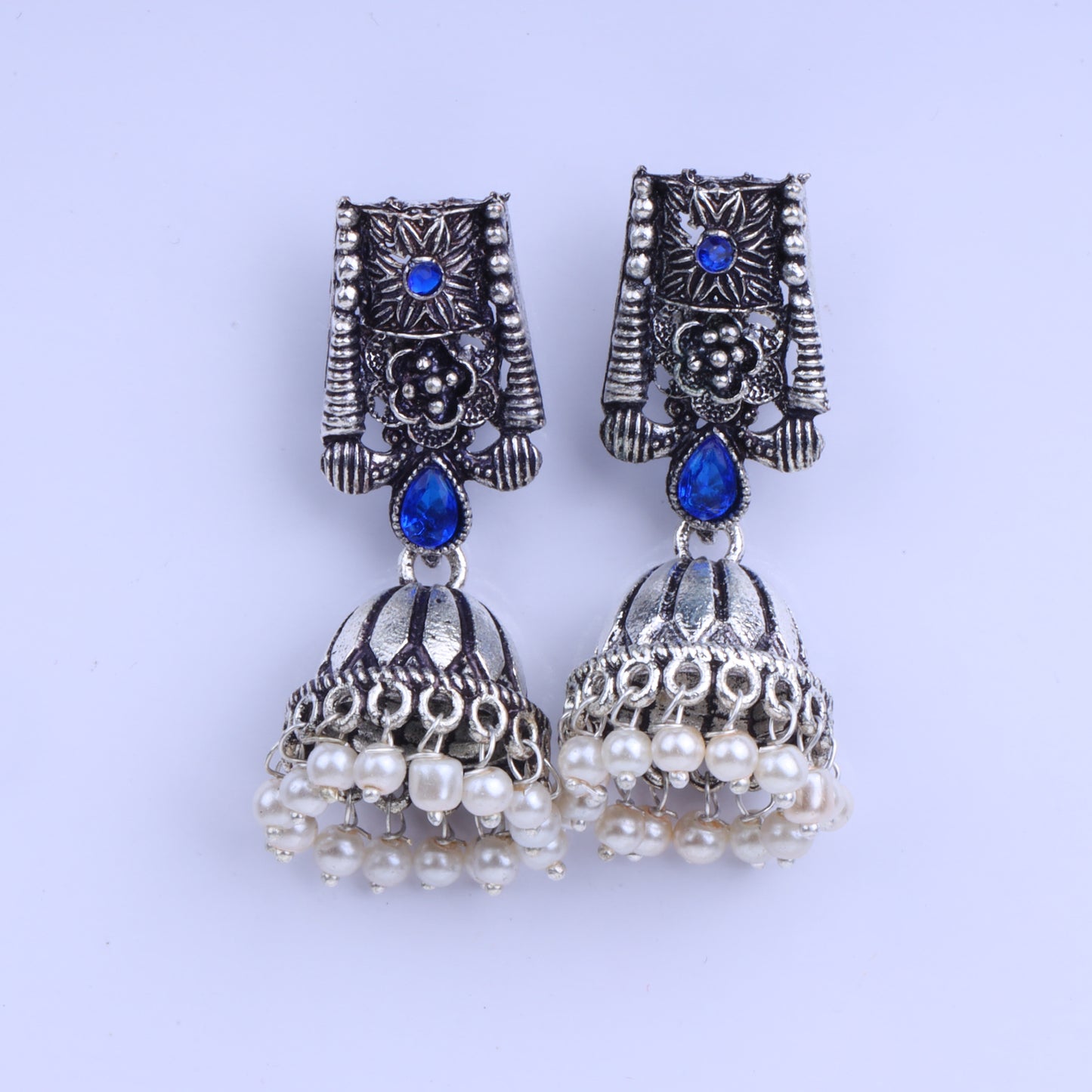 Blue Stone Studded German Silver Earrings With Brass Jhumki