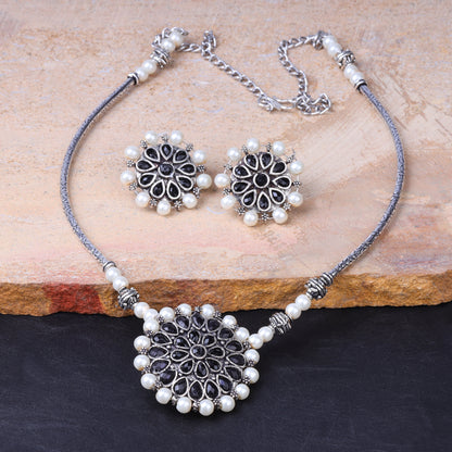 Stylish Brass Piped Neckpiece With Earrings Embellished With Black Stone And Pearls