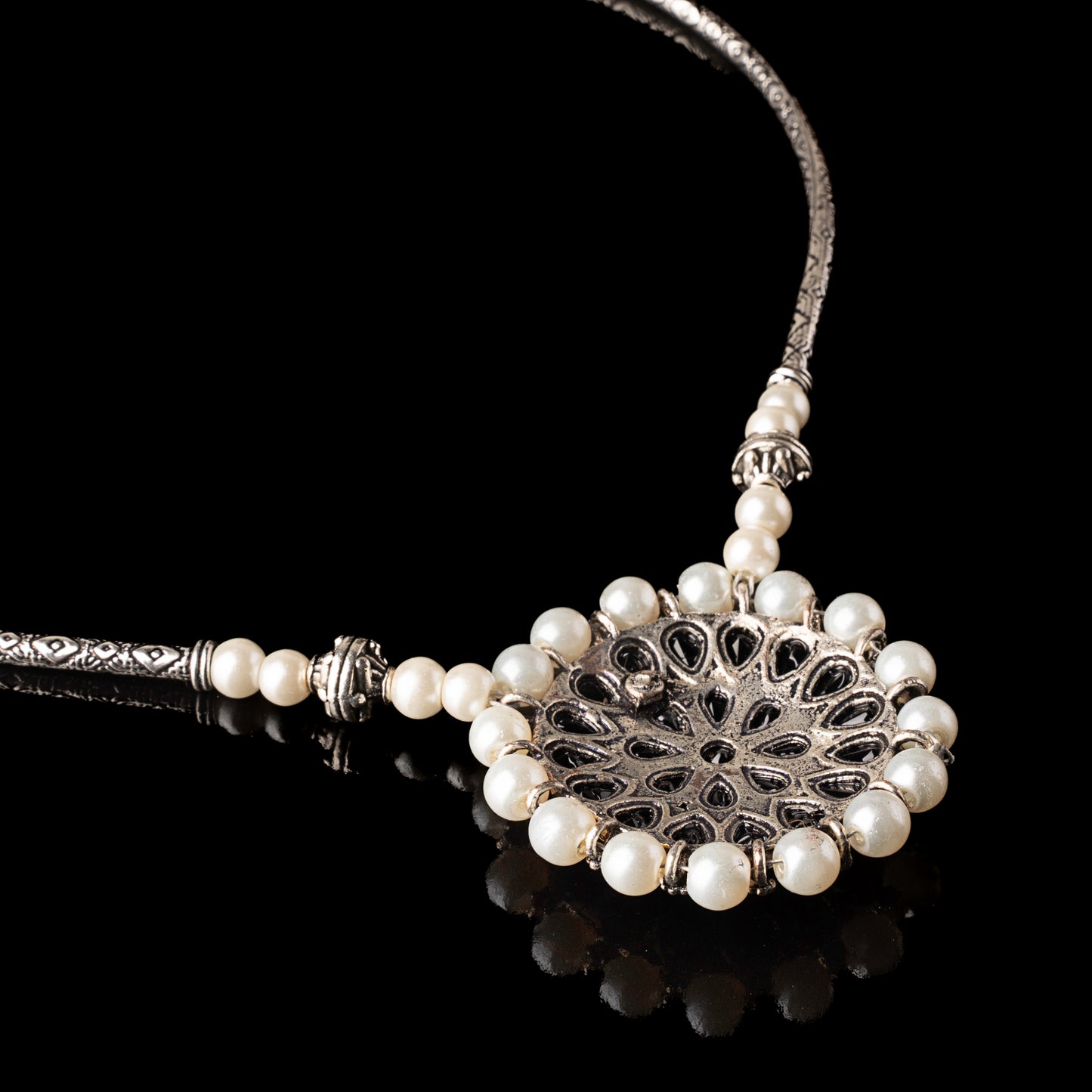 Stylish Brass Piped Neckpiece With Earrings Embellished With Black Stone And Pearls